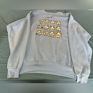 Light blue corgi emotions sweater